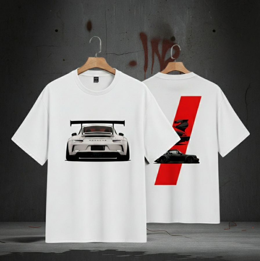 Two white t-shirts with car graphics on a dark background