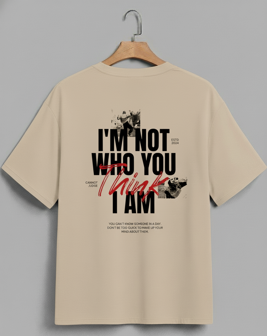 Beige t-shirt with black and red text on a gray background